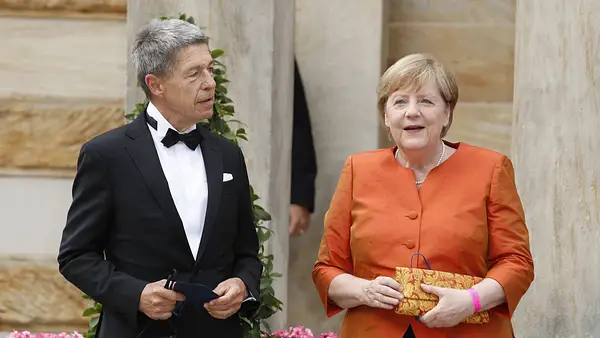 Joachim Sauer und Angela Merkel