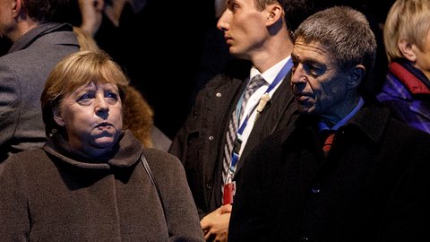 Angela Merkel und Joachim Sauer - Foto: Carsten Koall/ Getty Images