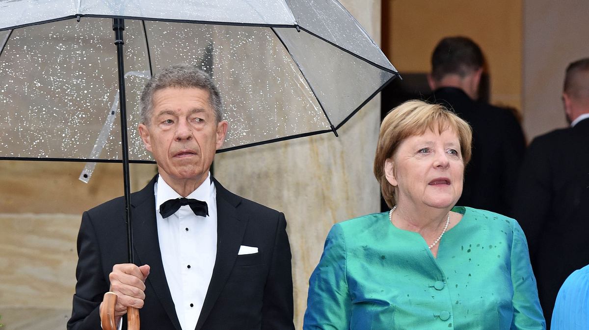 Joachim Sauer und Angela Merkel