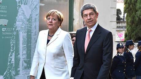 Angela Merkel und Joachim Sauer - Foto: Imago/Sammy Minkoff