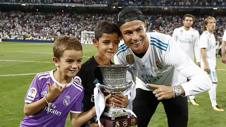 Christiano Ronaldo mit zwei seiner Kinder
