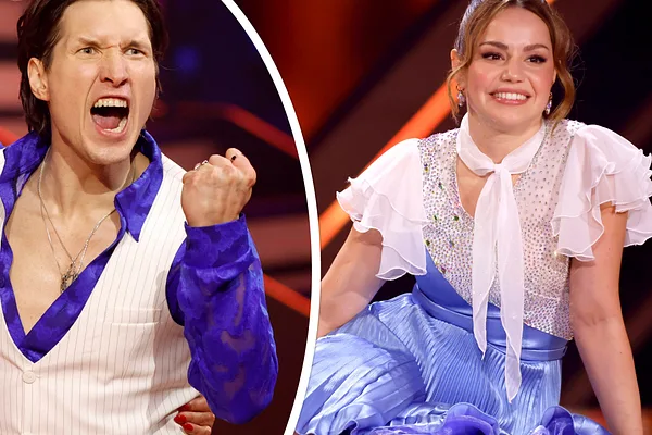 Evgeny Vinokurov ballt die Faust, während Christina Hänni lächelnd in die Ferne schaut.