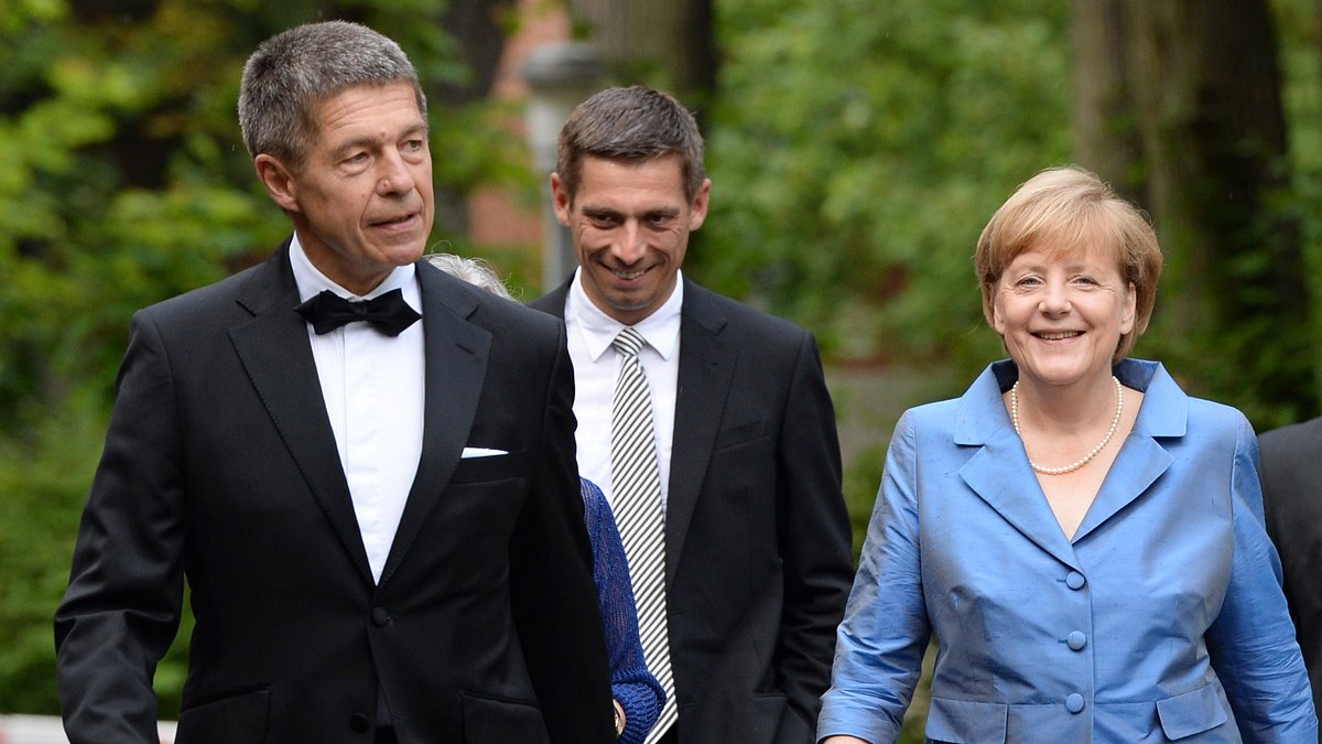 Joachim Sauer, Daniel Sauer und Angela Merkel