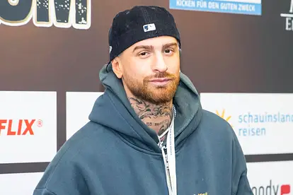 Gigi Birofio lächelt leicht in die Kamera.