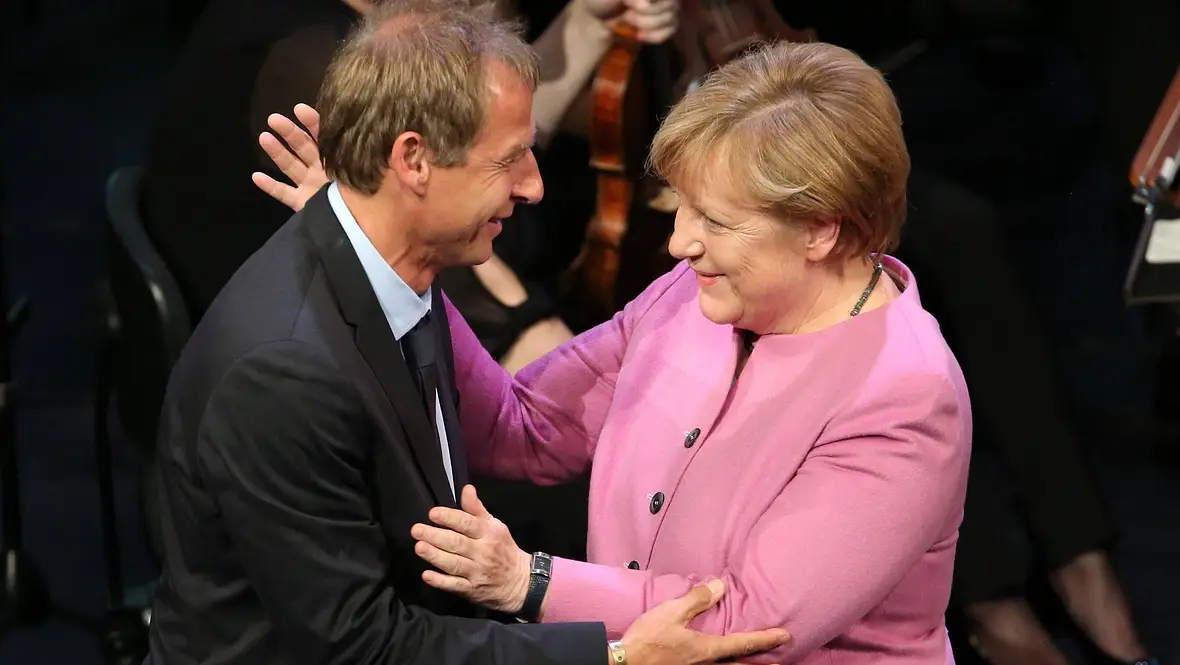 Angela Merkel & Jürgen Klinsmann Angela Merkel & Jürgen Klinsmann