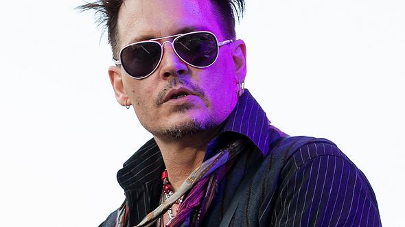 Johnny Depp hat genug von seinem Slim-Tattoo - Foto: Emelie Andersson/WENN.com