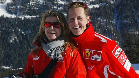 Corinna und Michael Schumacher - Foto:  STR/AFP via Getty Images