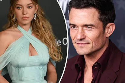 Orlando Bloom im roten Azug und Sydney Sweeney im hellblauen Kleid.