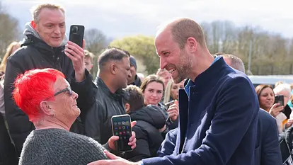Prinz William & eine Frau mit roten Haaren