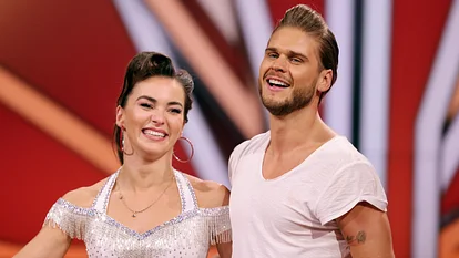 Rúrik Gíslason und Renata Lusin