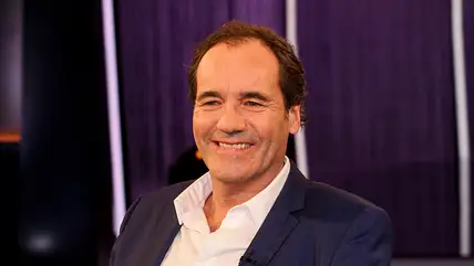 Thomas Ohrner grinst in die Kamera